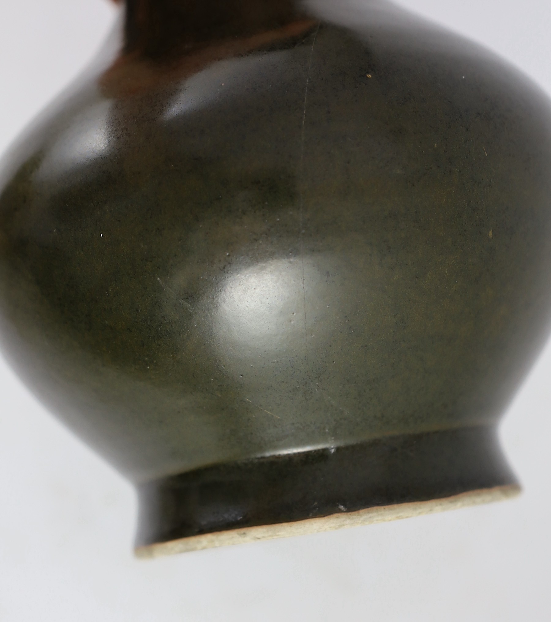 A Chinese Jian style brown glazed vase, hu, 18th/19th century, 31.5cm high, cracked, wood stand